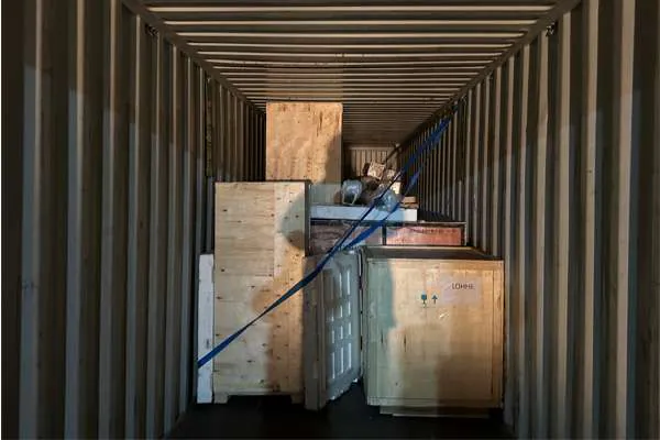 US K3 touchless car wash machine crates secured inside the container