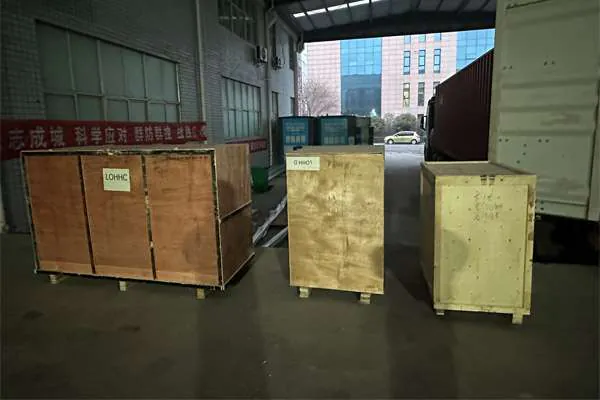 Wooden crates of the US K3 touchless car wash machine at the factory